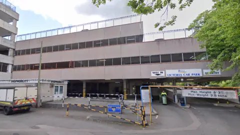 A picture of Victoria car park in Paignton. It is a beige colour building.