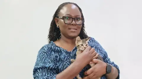 Naomi Mutua Naomi Mutua runs a Facebook community of cat lovers