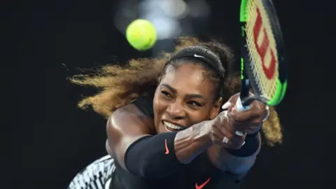 AFP January 28, 2017: Serena Williams of the US hitting a return against Venus Williams of the US during the women's singles final on day 13 of the Australian Open tennis tournament in Melbourne