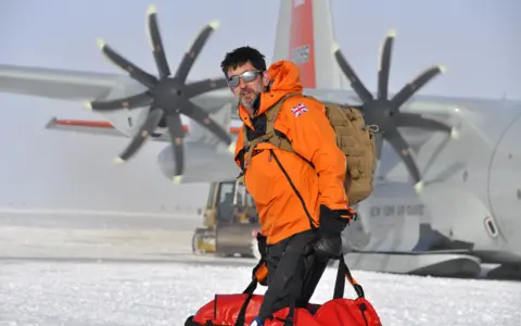 BBC Justin in the snow with bags