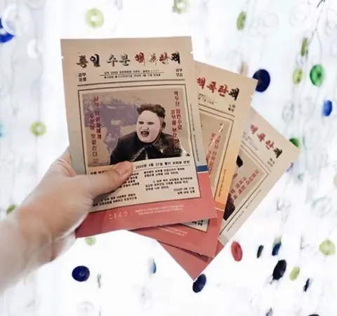 5149/Instagram Several packs of face masks on display