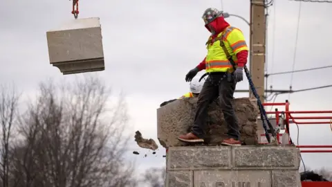 Reuters A Confederate monument removed in Richmond, Virginia, December 2022