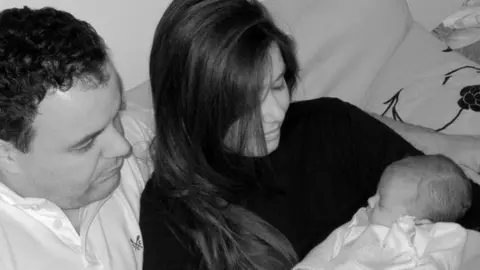 Andy and Zoe Clark-Coates Zoe and Andy Clark-Coates with their baby daughter