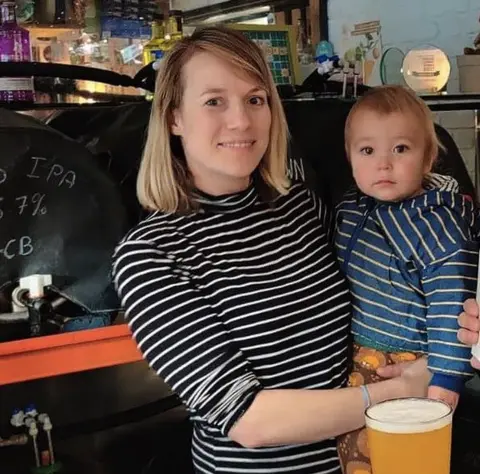 Garden City Brewery Holly-Anne Rolfe with son Bertie