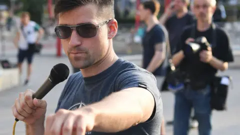 AFP Martin Sellner speaking during a rally organised by IBOe in Vienna, Austria. July 27, 2016