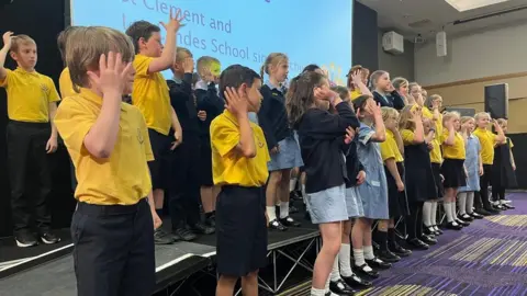 BBC Children performing sign language song