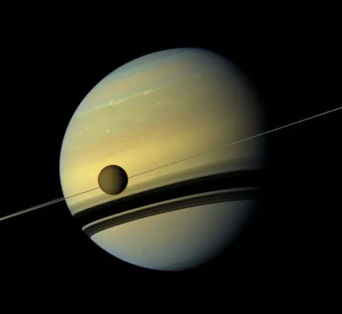 NASA/JPL-Caltech/SSI Titan and Saturn