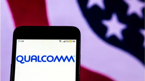 SOPA Images / Getty Images A phone displaying the Qualcomm logo