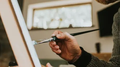 Getty Images Artist painting