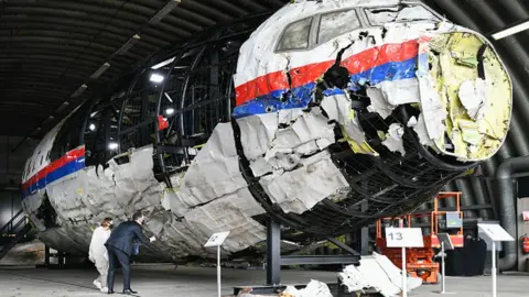 Getty Images A reconstruction of the wreckage of the Malaysia Airlines plane