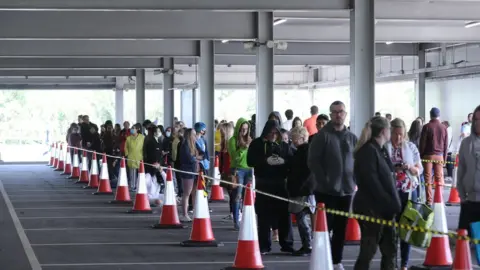 PA Media People queuing outside Ikea in Dublin as the next phase of Ireland"s Covid-19 lockdown exit begins