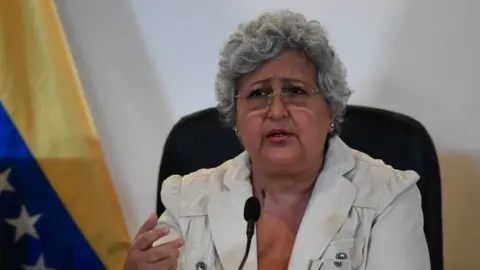 AFP The president of the Venezuelan National Electoral Council (CNE), Tibisay Lucena, speaks during a press conference about the fire on a CNE depot on the eve, at the CNE headquarters in Caracas, on March 8, 2020