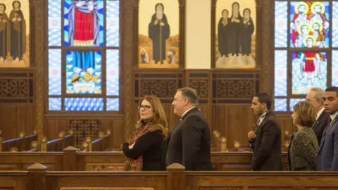 MOHAMED HOSSAM US Secretary of State Mike Pompeo (C) and his wife Susan (C-L) visit the newly inaugurated Cathedral of the Nativity Christ