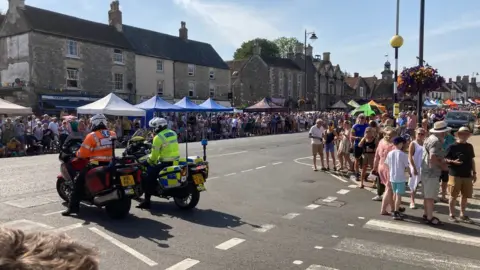 Spectators filling the streets in Sodbury