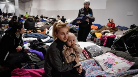 Getty Images A mother and baby in a shelter for refugees near Przemysl, Poland