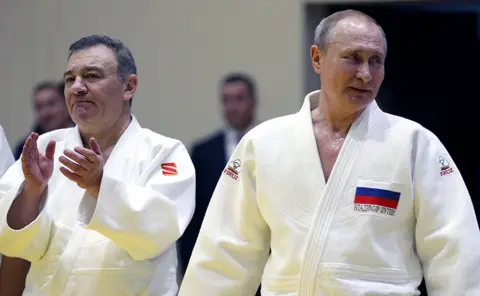 Getty Images Arkady Rotenberg and Vladimir Putin