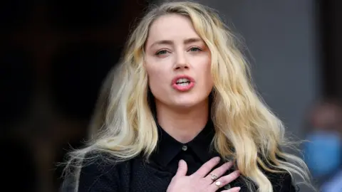 Reuters Amber Heard outside the Royal Courts of Justice