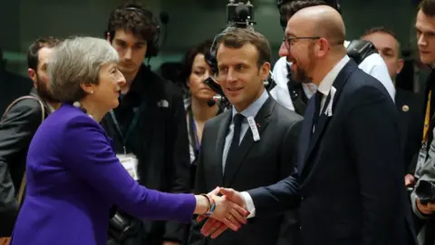 Reuters May meets France's Emmanuel Macron and Belgium's Charles Michel