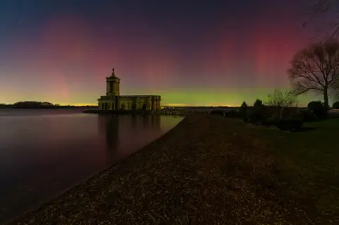 Jamie Hassall Aurora borealis over Normanton Church at Rutland Water