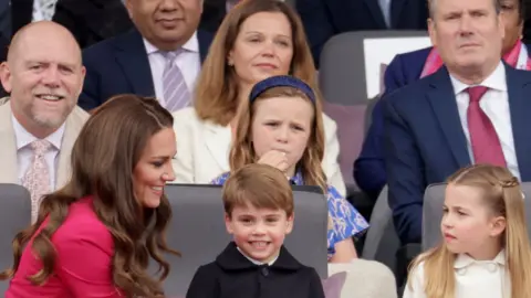 Getty Images Catherine, Duchess of Cambridge, Prince Louis of Cambridge, Princess Charlotte of Cambridge wait ahead of the Platinum Pageant