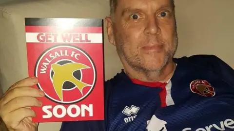 Chloë Williams Mr Williams with his card from the club