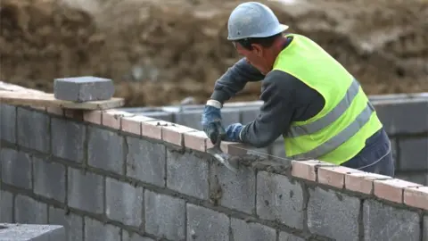 Getty Images A bricklayer in Bristol