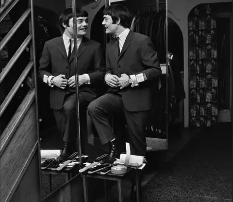 Evening Standard/Getty Images English drummer Jimmie Nicol at a Cecil Gee men's clothing store on Charing Cross Road in London on 23 June 1964