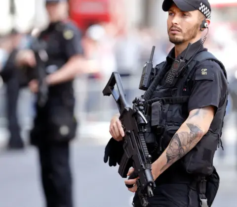 Getty Images A policeman with tattooo