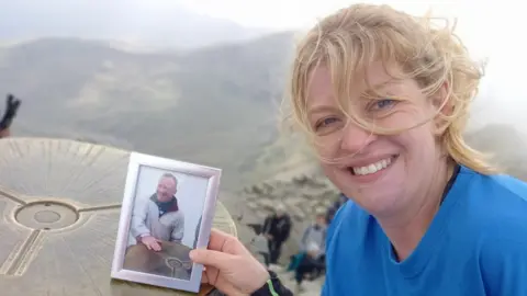 West Midlands Police Federation Ann-Marie Fox with photo of father John Rollason