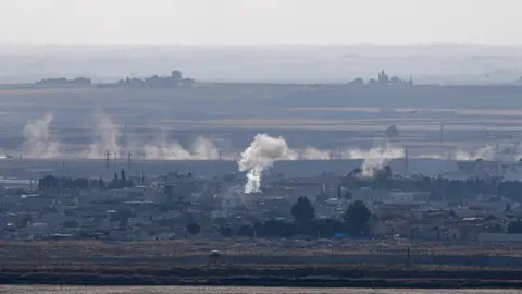 AFP Smoke over Ras al-Ain, 18 October