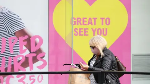 Getty Images Woman shopping