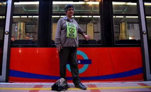 Reuters Person glued to train