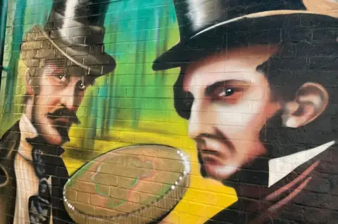 Katy Lewis/BBC Mural in Sovereign Way, an alley between Market Place and Chequer Street, St Albans