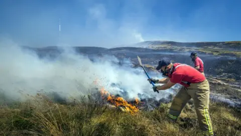 PA Firefighters tackling the fire at Winter Hill