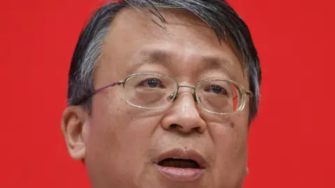 AFP Shen Chunyao, director of the Hong Kong, Macau and Basic Law Commission (L), speaks at a press conference in Beijing on November 1, 2019.