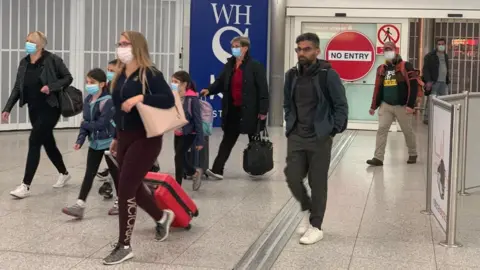 BBC people arriving at airport