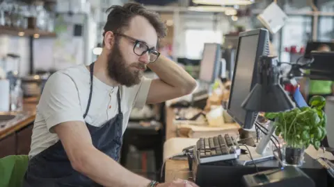 Getty Images Business owner worried