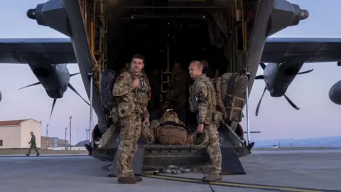 PA Media Lieutenant Colonel Oliver Denning and Duncan Maddocks on board the C-130 bound for Sudan