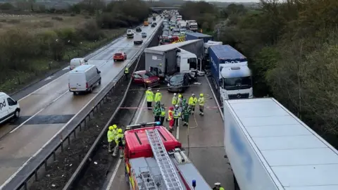 A12 Four lorries jackknife in eight vehicle crash