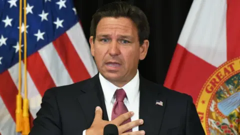 Getty Images Florida Gov. Ron DeSantis speaks at a press conference in Sanford, Florida