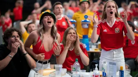 Getty Images Wales supporters at a Penarth fanzone