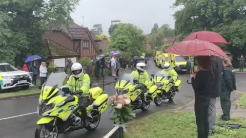 Emergency vehicles and crowds