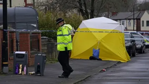 PA Media Crime scene in Thirlmere Avenue, Stretford