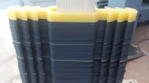 Debbie Harvey The mask adjusters