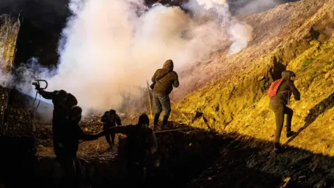 AFP/Getty US border agents fire tear gas at migrants on the Mexican border