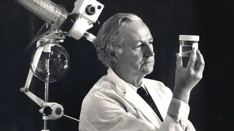 Getty Images Dr William McBride in his science lab