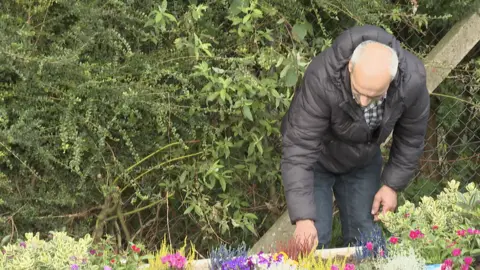 Bassam at community garden