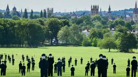 Geraint Lewis/Standing with Giants  The silhouettes and Oxford's dreaming spires and city centre