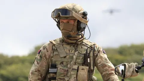 A soldier from the Royal Marines as part of Project Virtuo at Lulworth Range in the UK