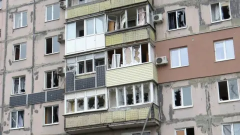 Reuters A residential building, which locals said was damaged by Russian shelling, in Mariupol, Ukraine